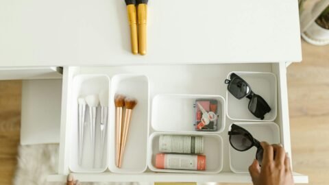 a person organizing the drawer